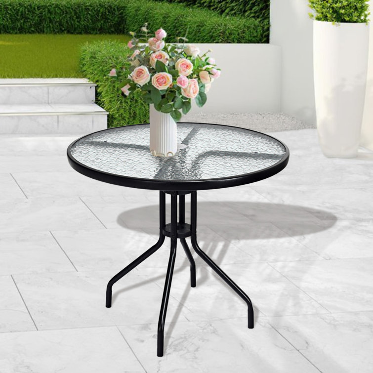 Metal and glass outdoor best sale dining table